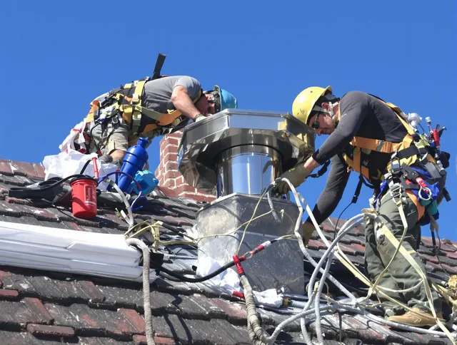 Protective chimney cap installed by Wrentham Chimney Sweep in Wrentham, MA